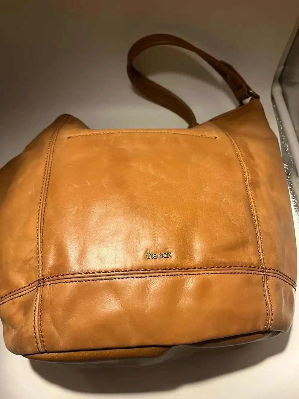 The Sak Sequoia Hobo Bag in Tobacco Floral Embossed Leather